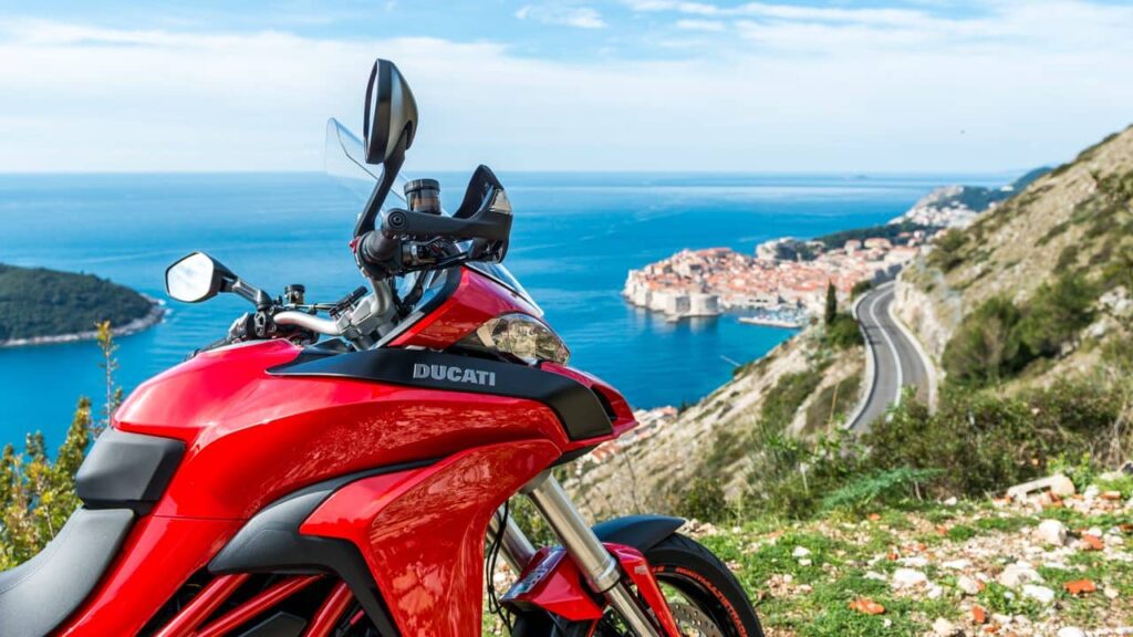 Brabel Rental Agency Ducati Multistrada with Dubrovnik Old Town in background